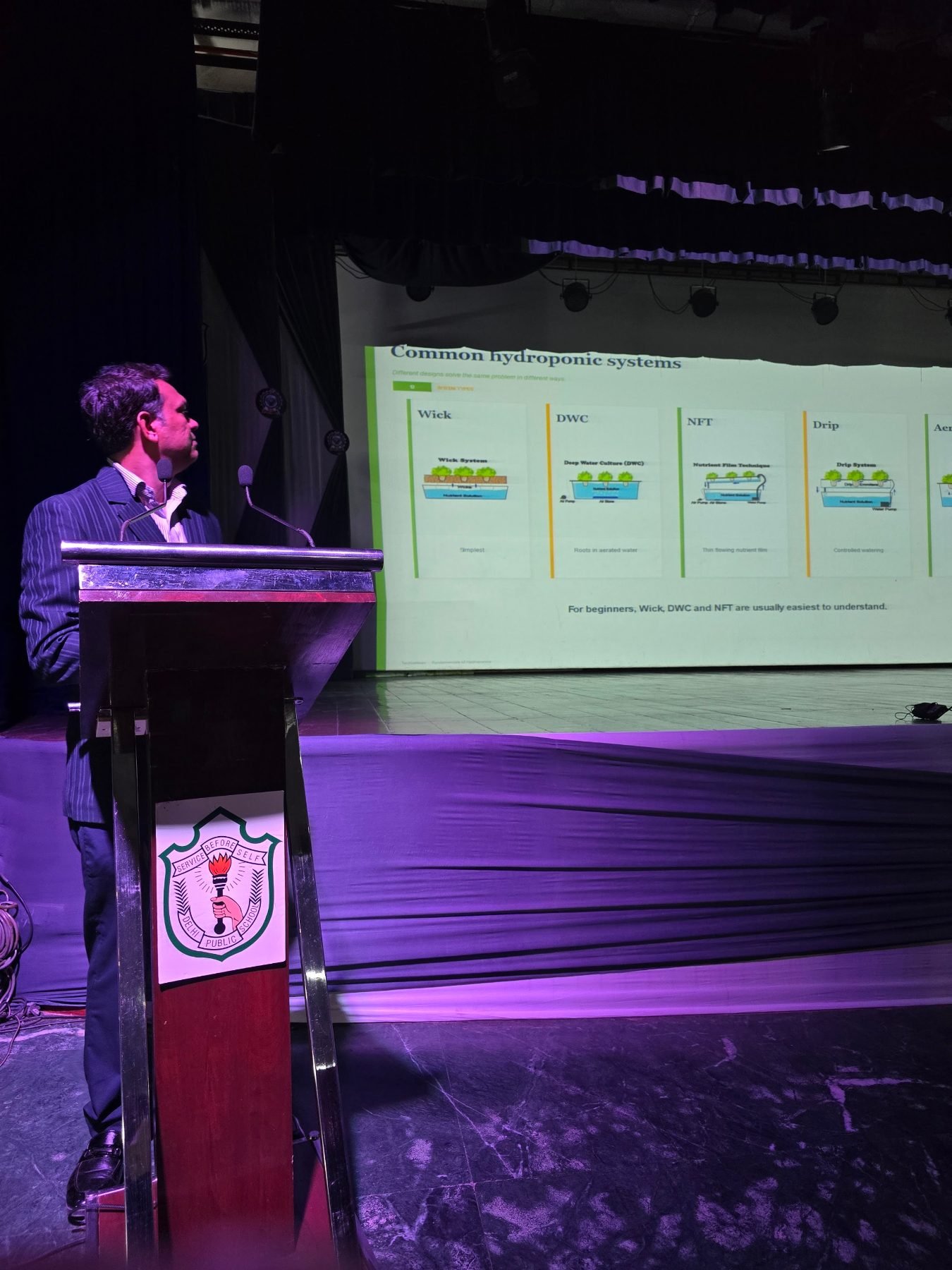 Walking through common hydroponic systems on screen at DPS Faridabad